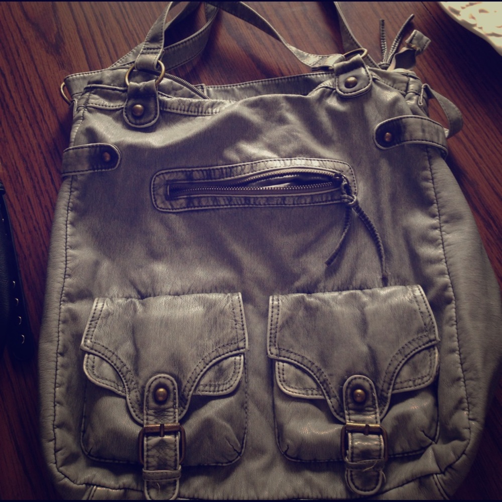 Distressed cross body