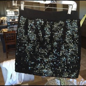 Black sequin skirt with elastic band.