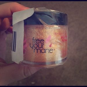 Free your mane curl product with hint of gold