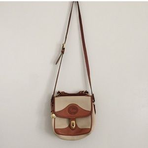 Genuine dooney cream and tan satchel purse