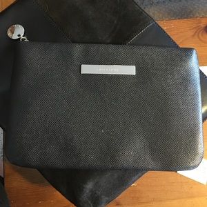 Ivanka Trump black clutch wallet