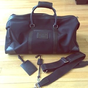 Gently used Coach duffle bag with accessories
