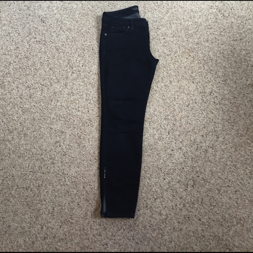 Dark denim ankle length.