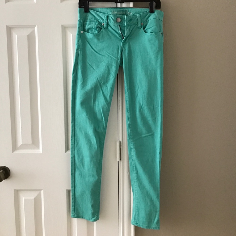 Teal skinny jeans