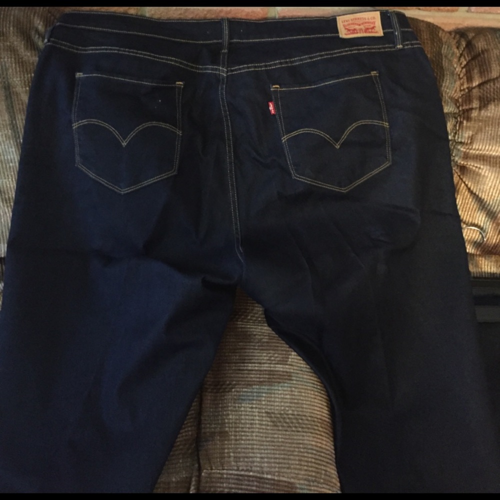 Dark blue Levi's, 24W