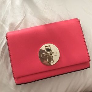 Pink clutch with cross body strap! Kate spade