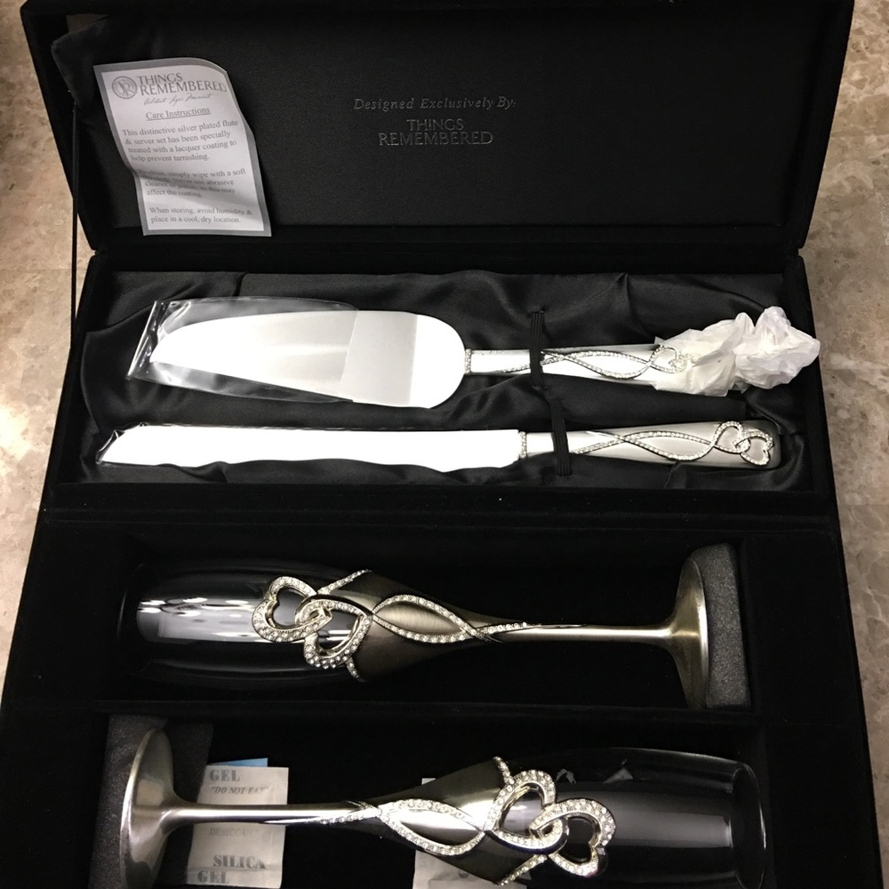 Wedding cake cutter and flutes.