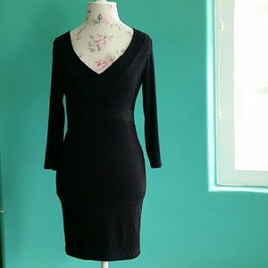 Black dress with plunging neckline