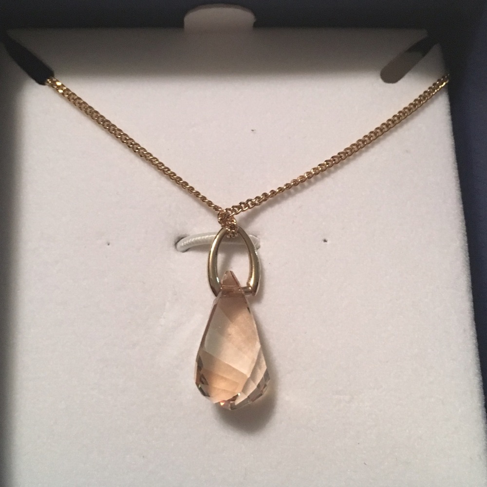 Swarovski-New in box gold chain pendant