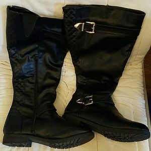 Knee high black zippered boots