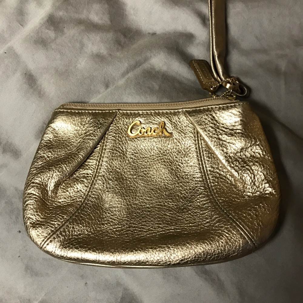 Gold metallic leather coach wristlet