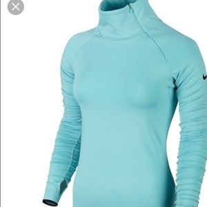 Nike turquoise DriFit size L. Long sleeve side zip
