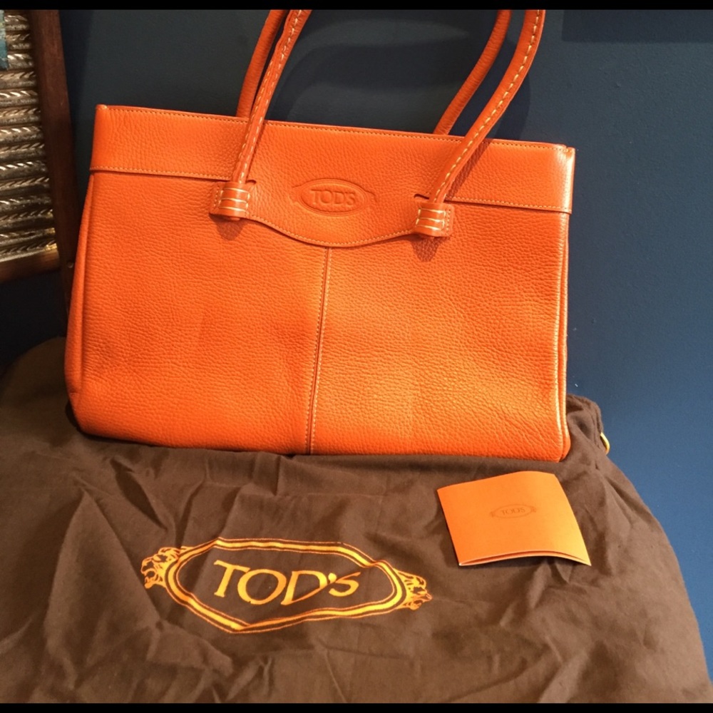 Orange leather Tod's purse