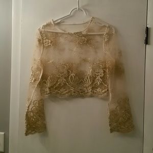 Fancy sheer top with gold trim detail