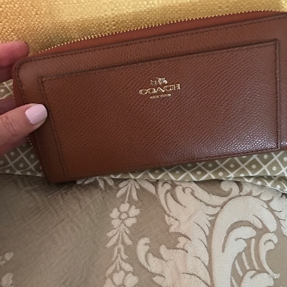 Coach wallet. Rarely used. Full zip.  Classic.