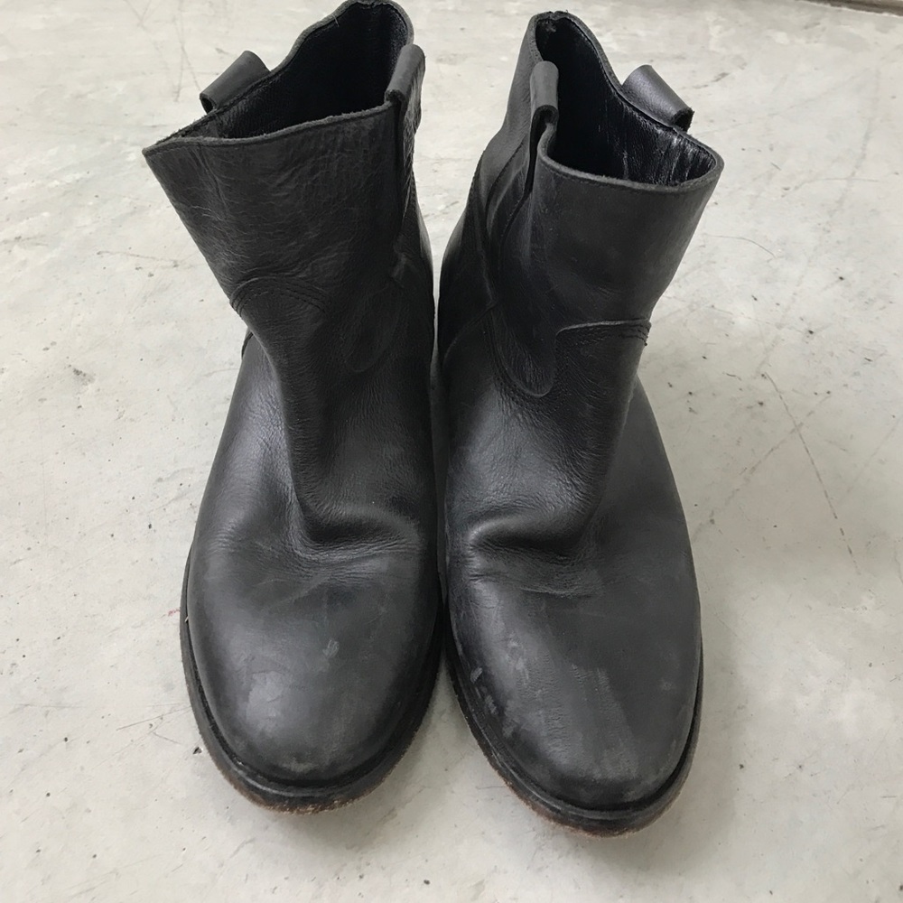 Black leather Barney's Ankle boots