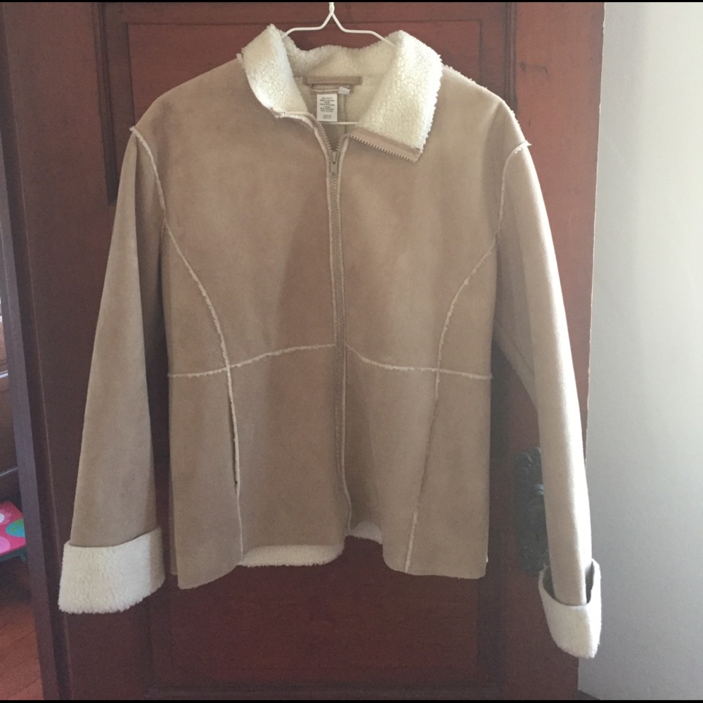 Great condition, looks like suede