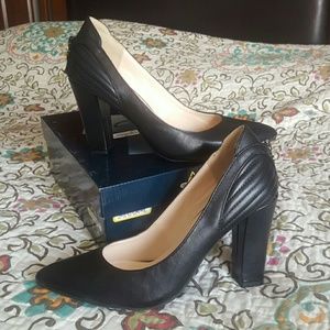 Black leather heels with zipper