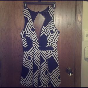 Black and white romper low cut and open back
