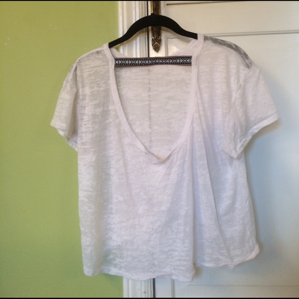 White t-shirt, open back, strap across back