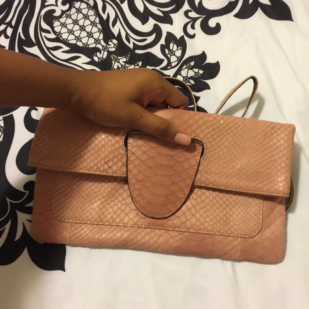 Snake skin clutch bag