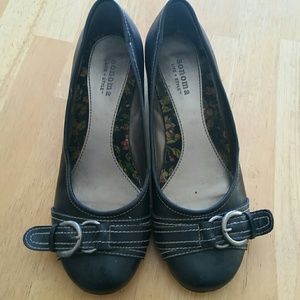 Black shoes with silver buckle
