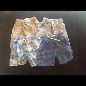 Four pairs of baby boy shorts. 12 months