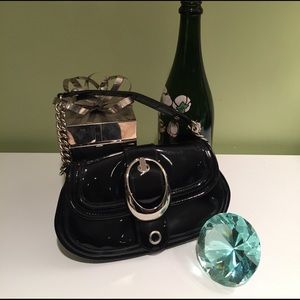 Great go-anywhere black "patent" mini bag!