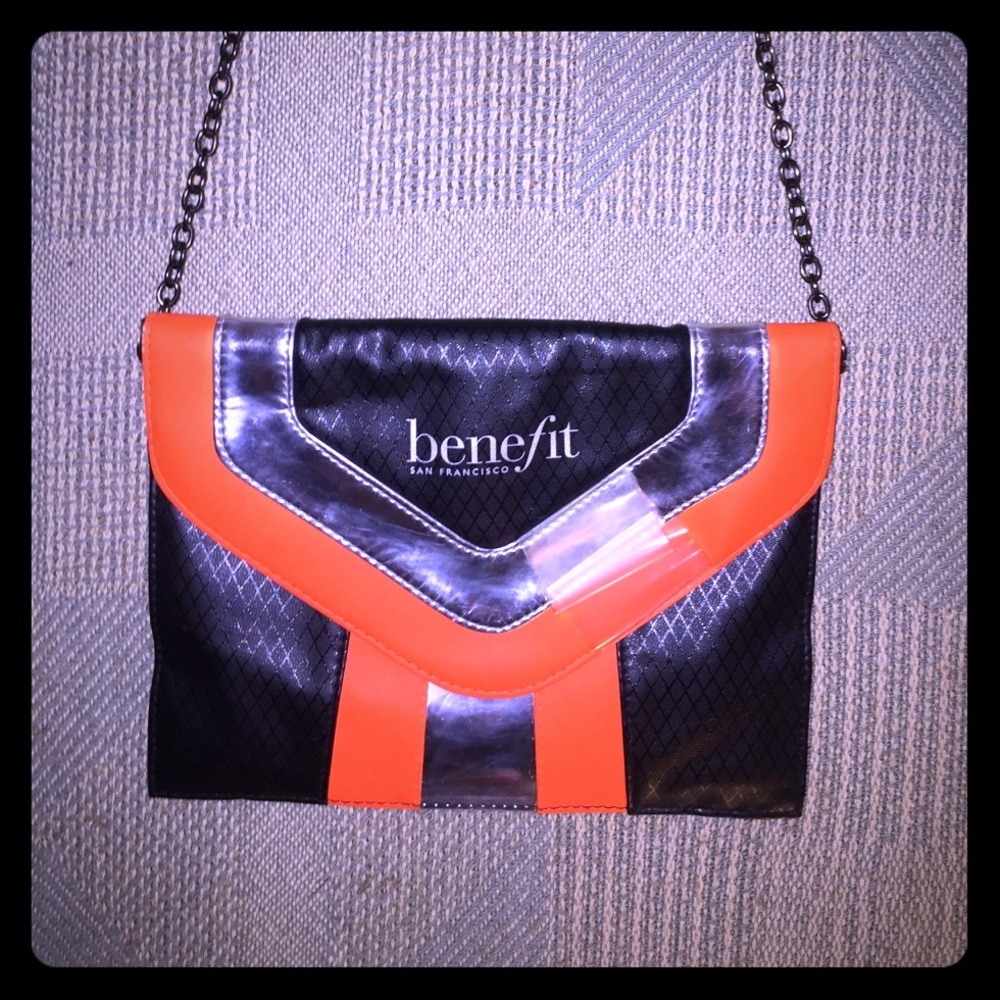 Benefit cosmetic bag has chain & leather strap