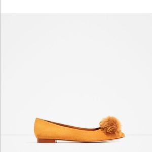 Leather pom pom ballerina