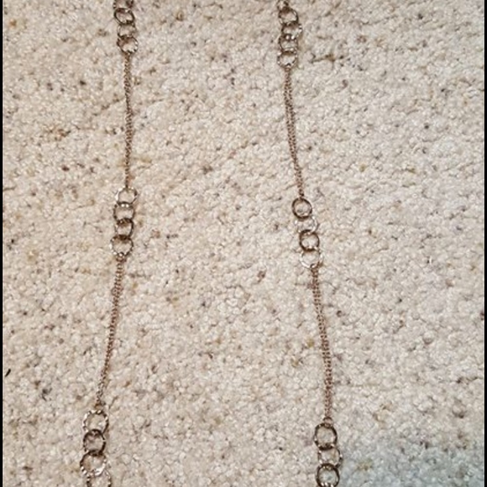 Long gold necklace