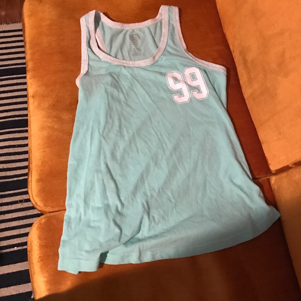 Light green 49 shirt.