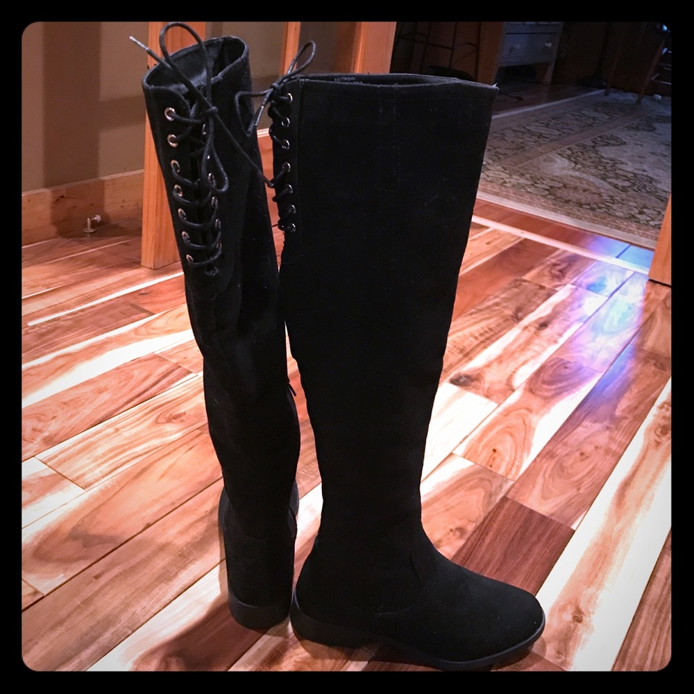 Knee-high boots with lace ties