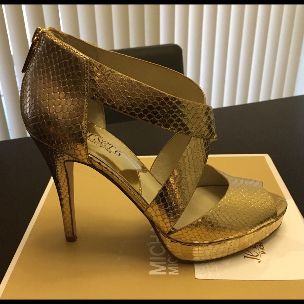 Michael Kors platform heels in gold, size 7.