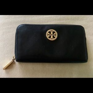 Tory Burch "Dena" zip around wallet in black.