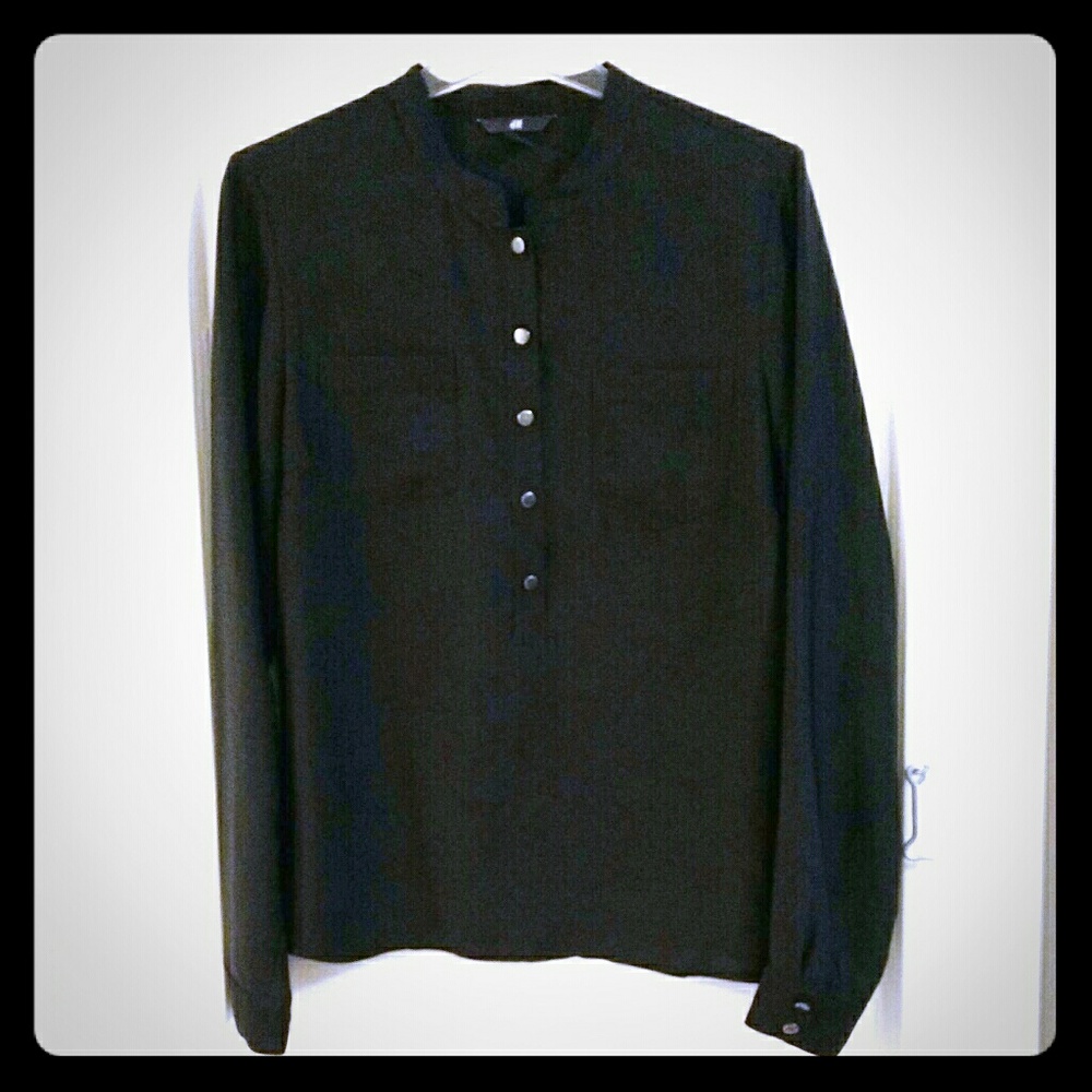 Long-sleeve black blouse for work.