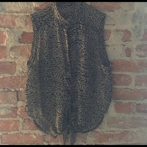 Tank top with tie at bottom