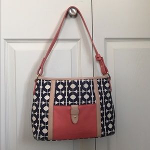 Moderately worn Spartina purse.