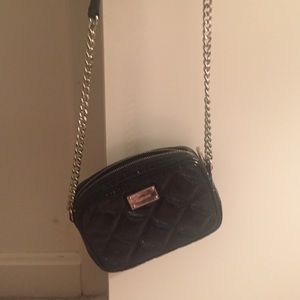 Michael Kors cross body purse.