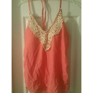 Coral tankini with embroidered lace neckline