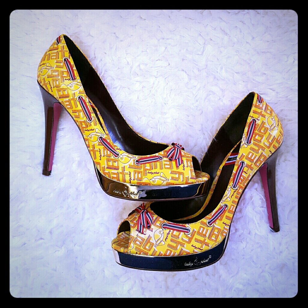 Yellow, peep toe stilettos