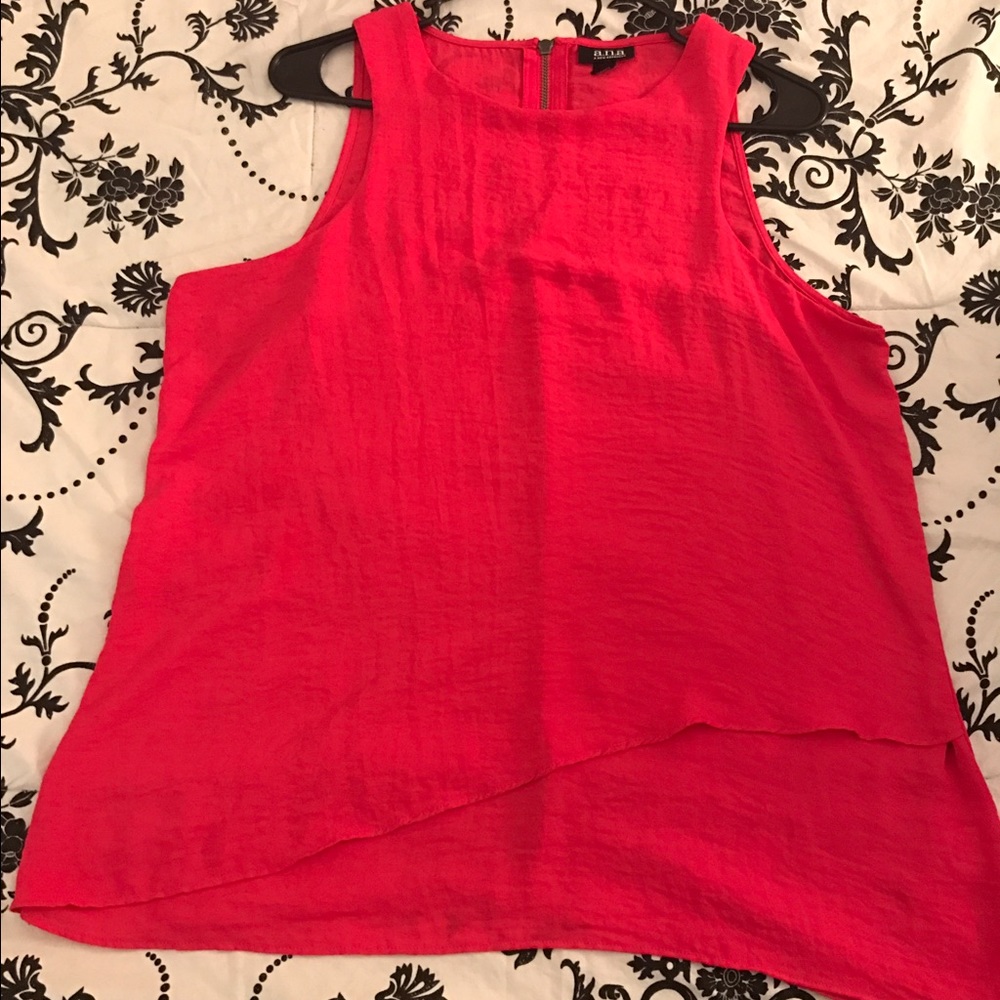 Pink sleeveless blouse