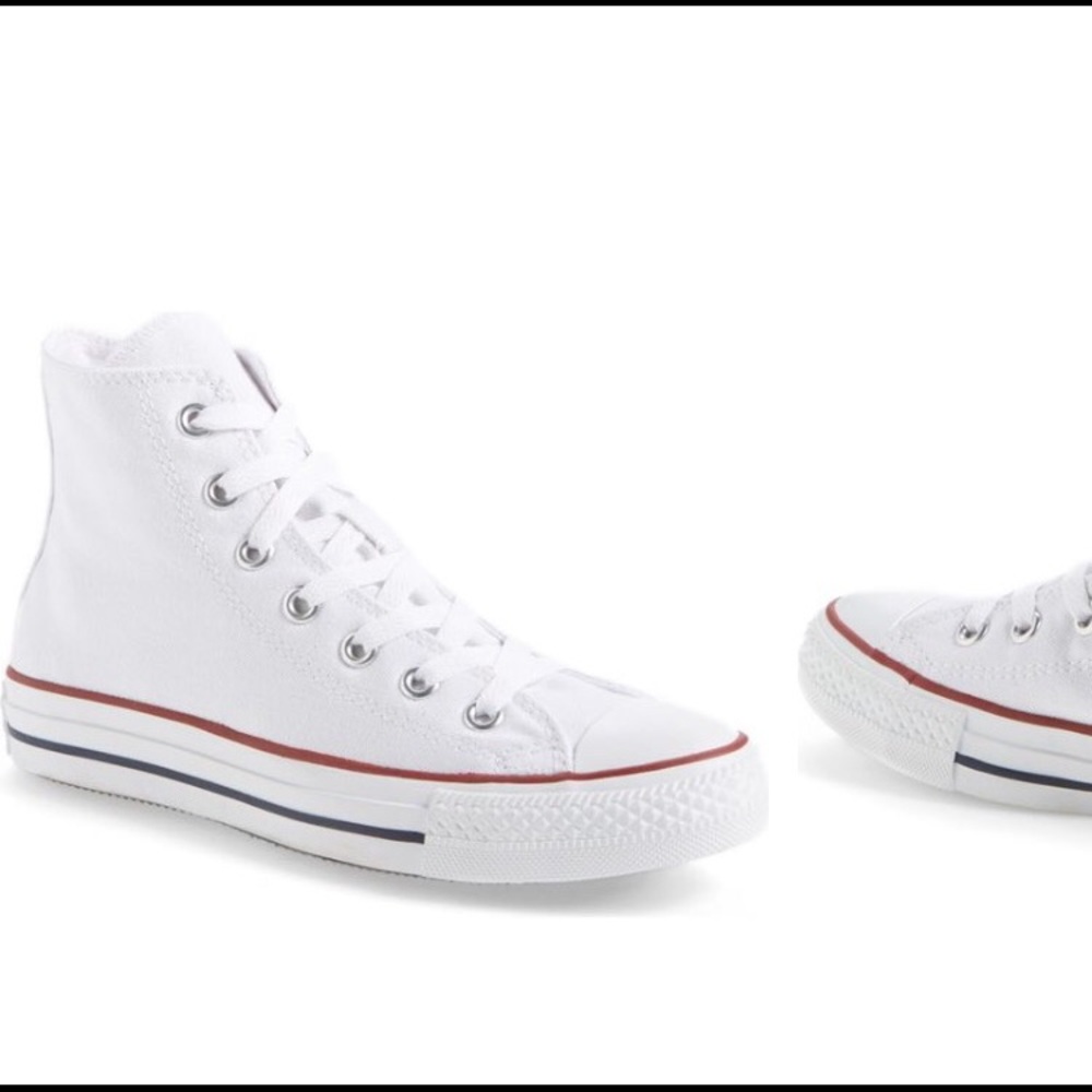 Authentic Chuck Taylor white high top converse.