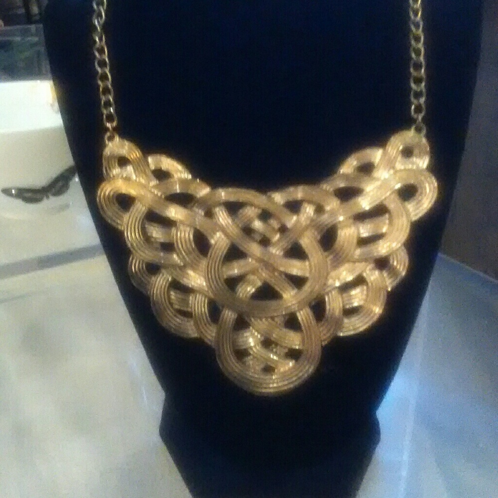 Gold metal scroll statement necklace