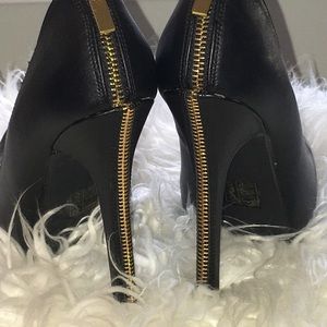 Black zipper back heels