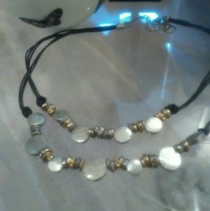 Mixed metal and leather double strand necklace