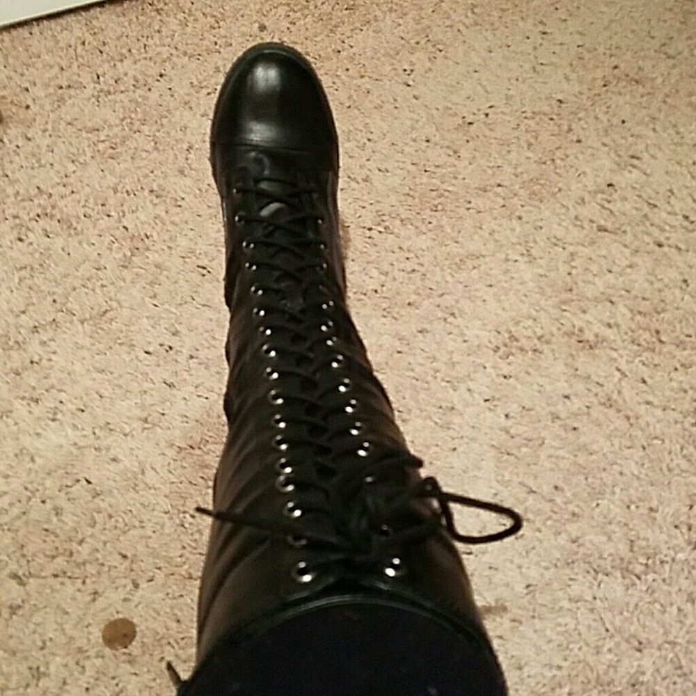 Knee high lace up boot