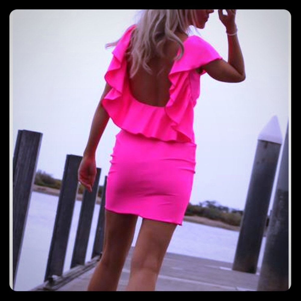 Neon pink ruffled dress
