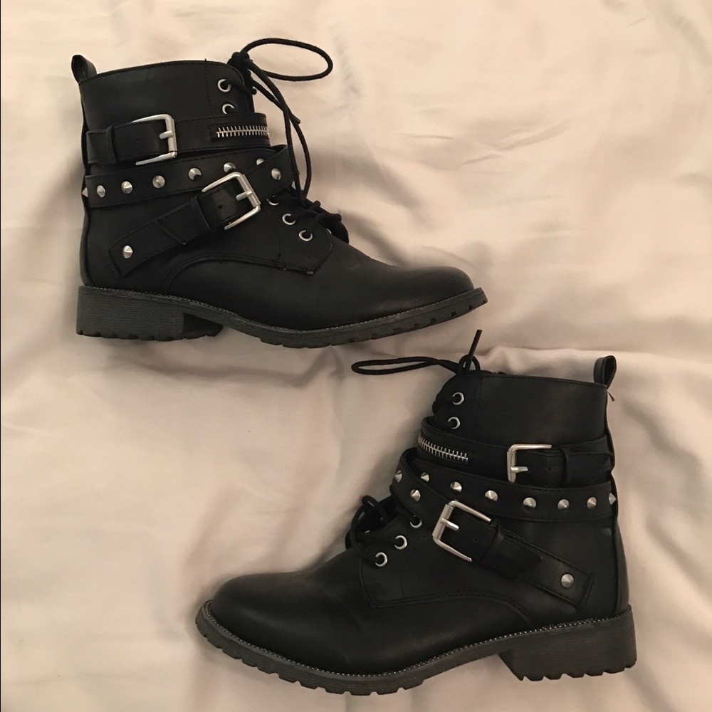 black moto boots with silver detailing