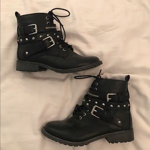 black moto boots with silver detailing
